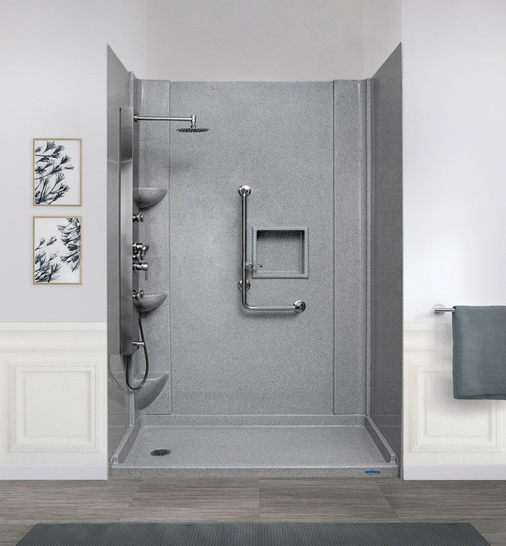 Walk-in shower with gray FiberGranite walls, a bench, grab bar, and recessed shelf