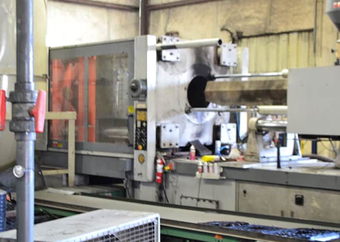 Clamp end of an injection molding machine